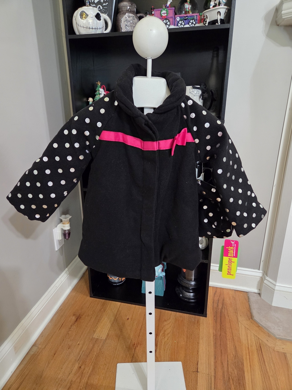 Penelope Mack Black Coat with White Polka-Dot Sleeves And Matching Hat